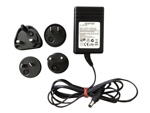 Power Supply With Interchangeable Plug Adapter