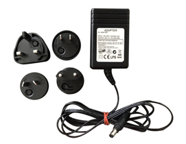 Power Supply With Interchangeable Plug Adapter