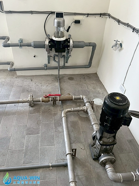 Automatic backwash pre-filter combined with booster pump installation for stable household water supply